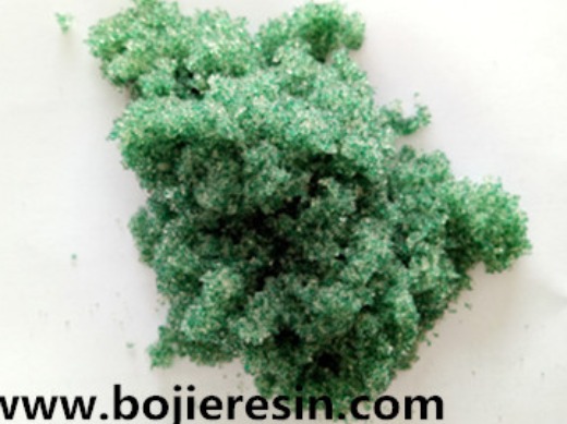 Cadmium removal resin